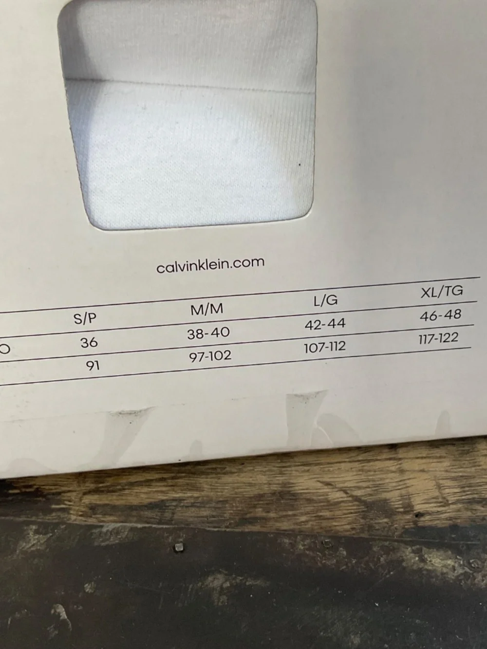 Calvin Klein white tee shirts,new in box.L.
